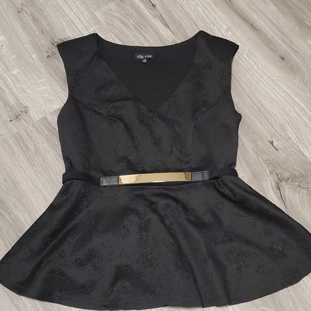 City chic peplum top
